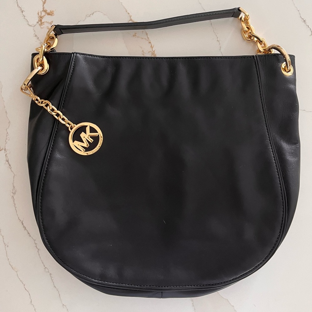 Michael Kors Black Hobo Bag with Gold Accents